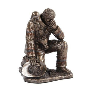 5.75 Inch Bronze Colored Fireman Reflecting on One Knee Figurine